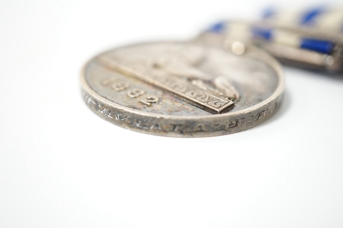 A Queen Victoria medal pair comprising an 1882 Egypt Medal and an Egypt Star, awarded to Lieutenant Colonel R. Vivian, engraved in italicised uppercase script. 1st Scots Guards. Condition - fair to good.